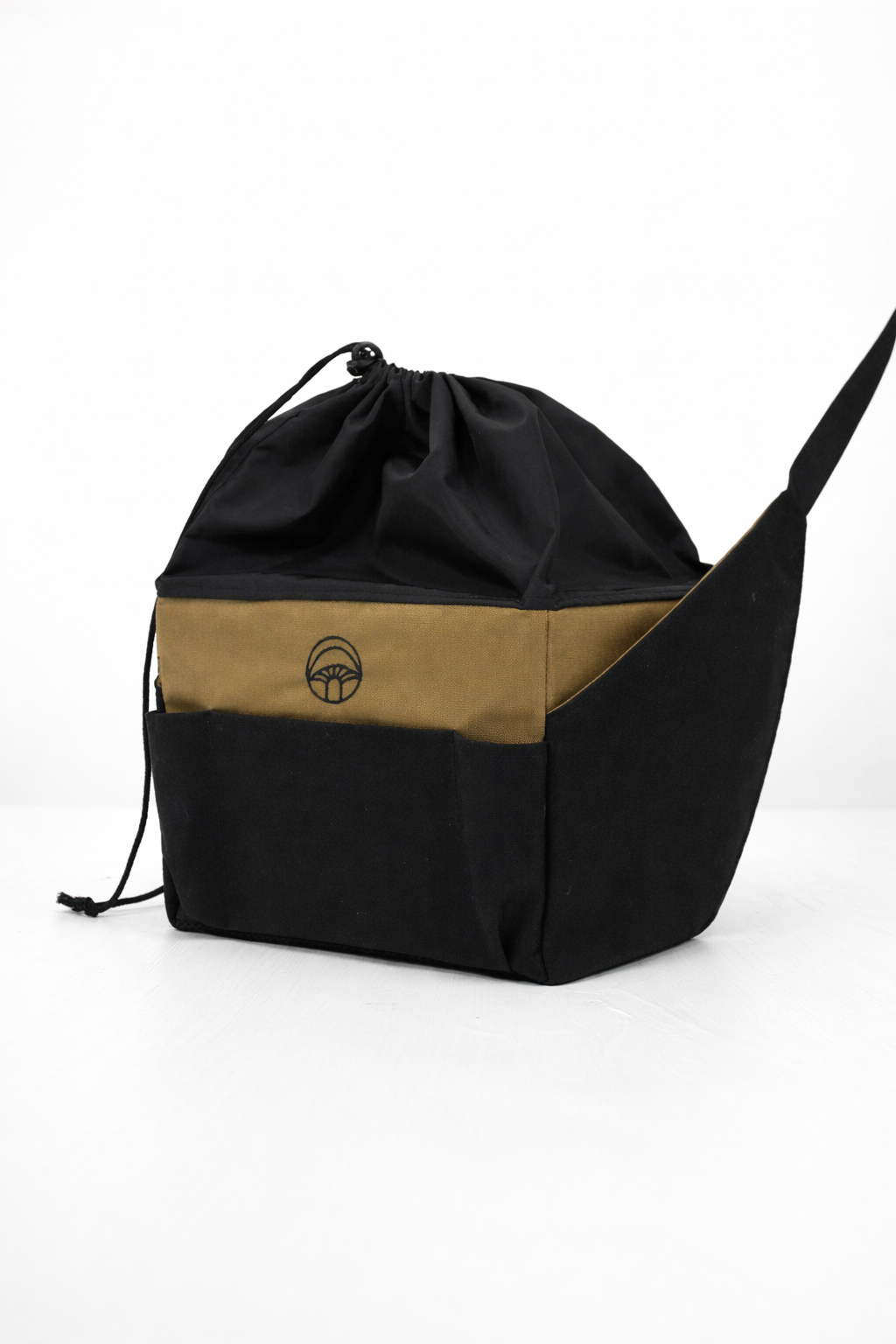 Black and brown drawstring bag on a white background