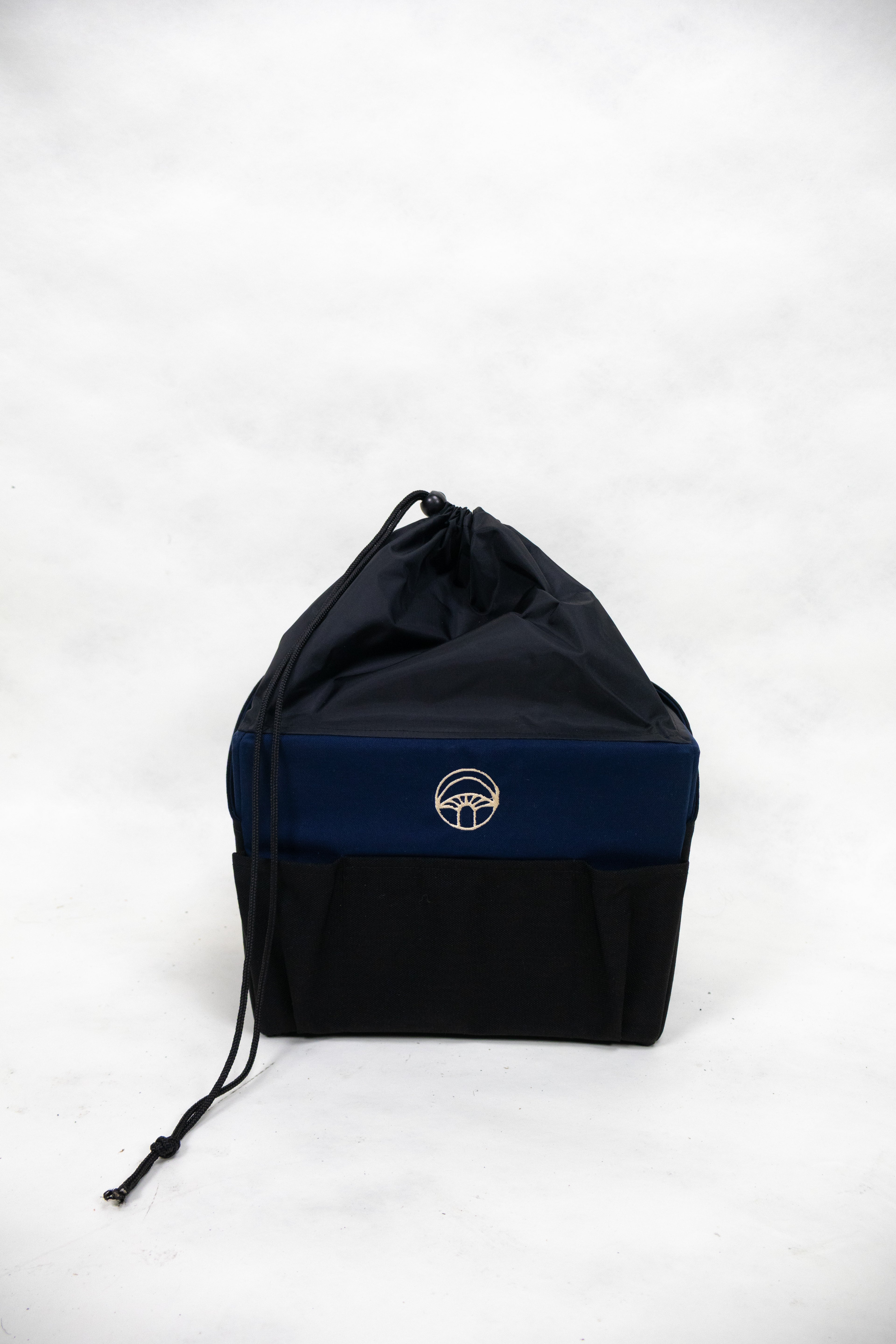 Dark blue drawstring bag with a logo on a white background