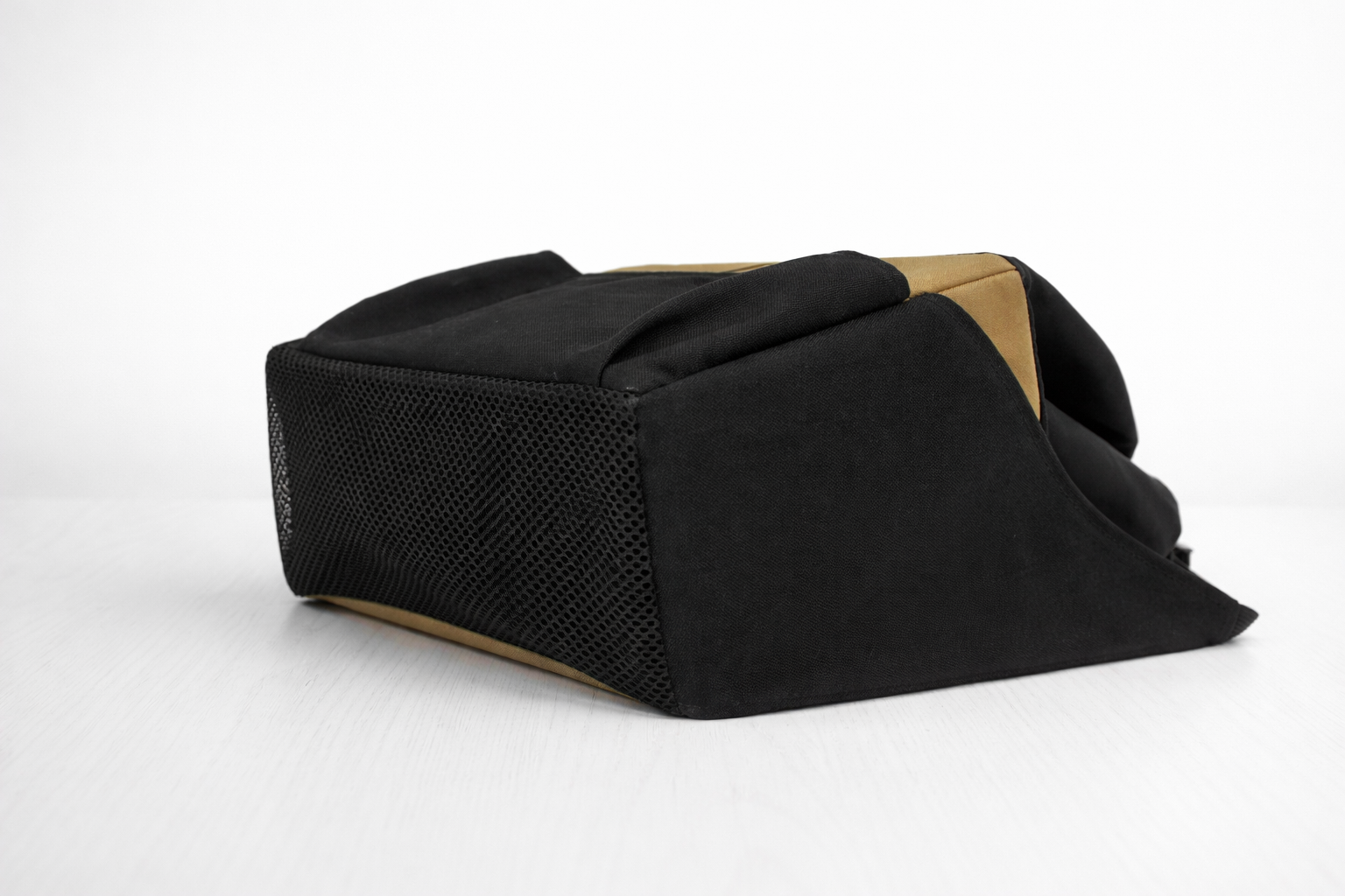 Black and brown bag on a white background